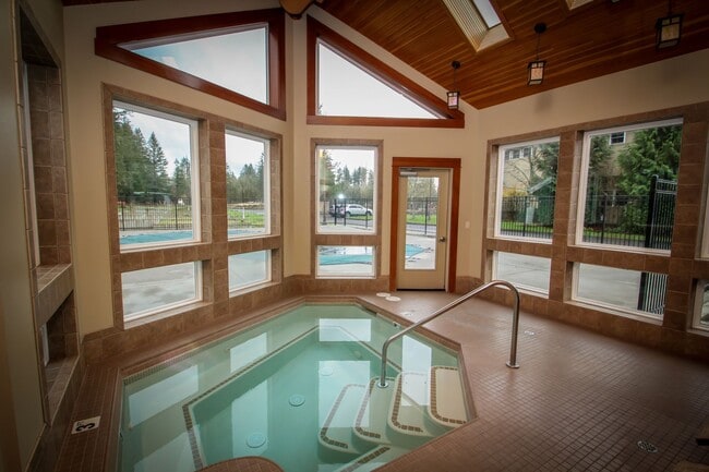 Building Photo - 2 Creeks Condominiums - Gated Community on...