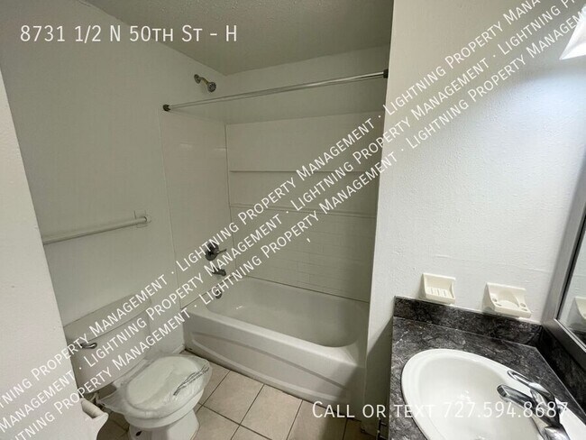 Building Photo - 8731 1/2 N 50th St-H
