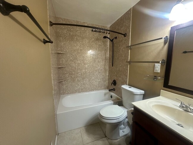 Building Photo - Centrally Located 2 BR Green Townhome with Fenced Patio