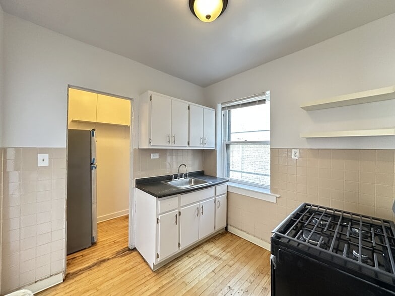 Building Photo - 7147 S Constance Ave