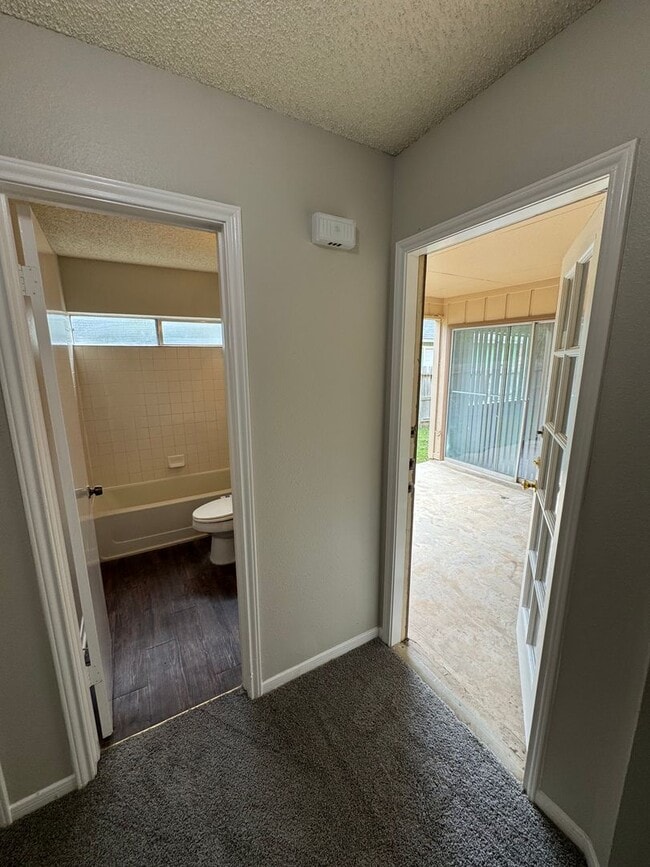 Building Photo - NICE 3 BEDROOM FEATURING WOOD VINYL PLANK ...