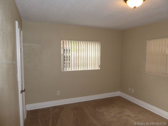 Building Photo - 3220 SW 118th Ct