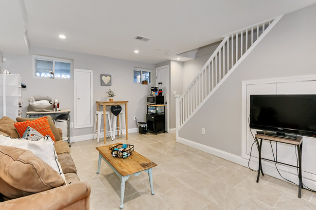 Basement Living area space-Some of the decor may change at time of rental. - 123 36th St NE