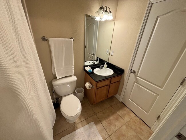 Building Photo - Fully Furnished 3-Bedroom Townhome