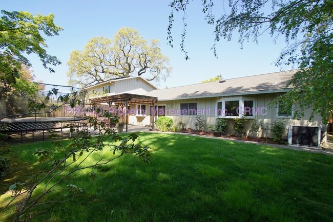 Building Photo - "Charming 4-Bedroom Oasis in San Rafael wi...