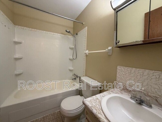 Building Photo - 6881-6887 Emerald Ave