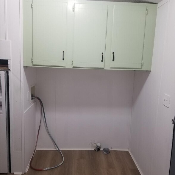 W/D Hook up in large laundry room with broom closet and space for laundry basket - 2320 Delmar Rd