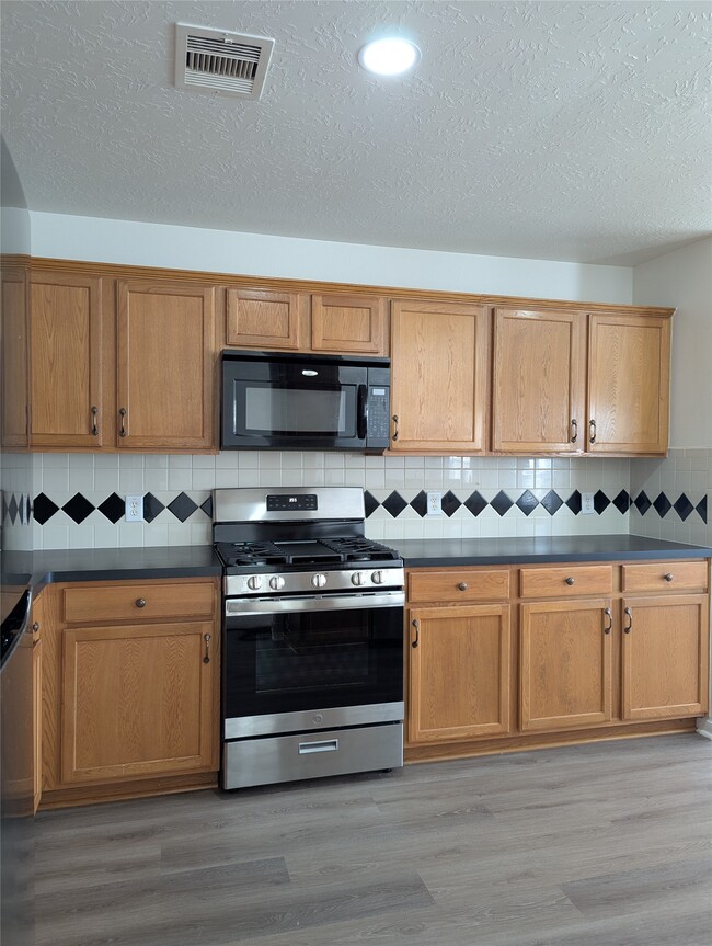 Building Photo - 5618 Savannah Woods Ln