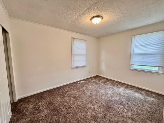 Building Photo - Lawn Care Included in Jville City Limits!