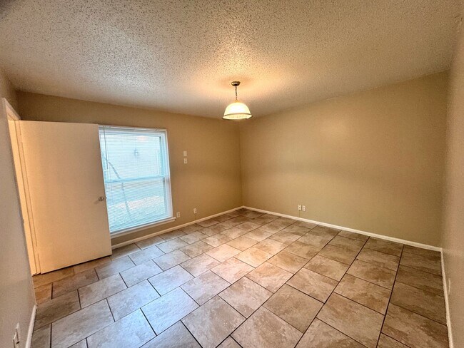 Building Photo - Single-level living on ground floor  |  Fresh paint (July 2026)  |  2 carports  |  Community Pool...