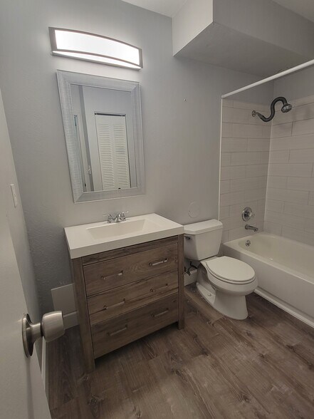 Bath-brand new flooring - 3663 S Sheridan Blvd