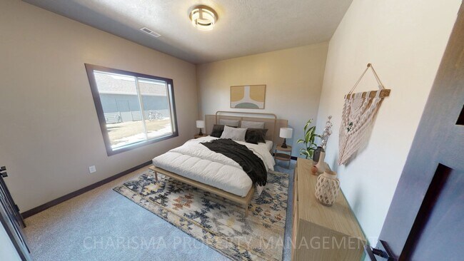 Building Photo - WALK IN AND AMENITY FILLED THREE BEDROOM TOWNHOME!