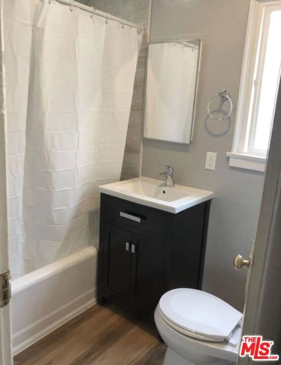 Building Photo - 1229 W 36th Pl