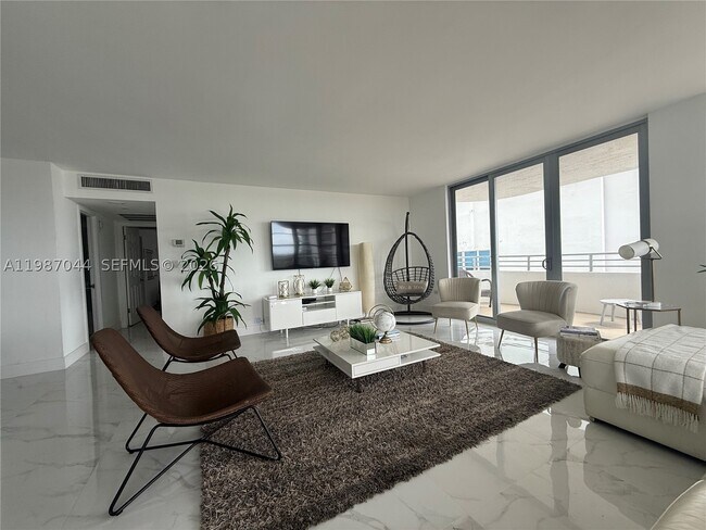 Building Photo - 5555 Collins Ave