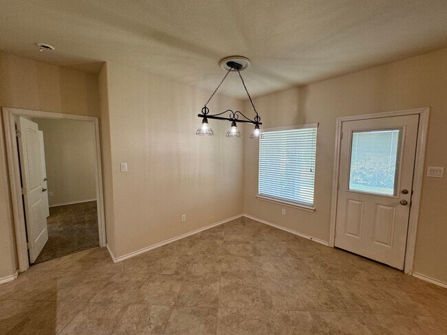 Building Photo - Argyle ISD Gem with Huge Private Backyard & Open Floorplan