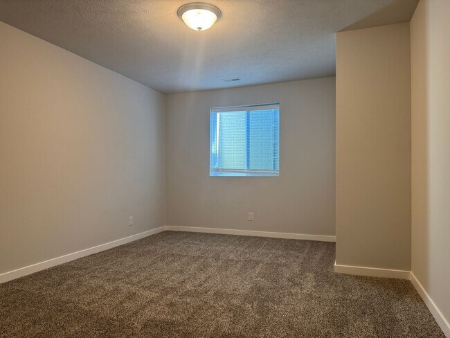 Building Photo - Spacious 4-Bedroom Ranch with Finished Basement & 3-Car Garage