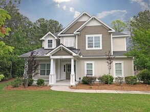 Building Photo - Custom 4 BD/2.5 BA Home with Community Pool, Water Access and Day Dock!