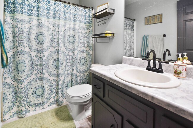 Building Photo - Pet Friendly Three Bedroom with Basement!