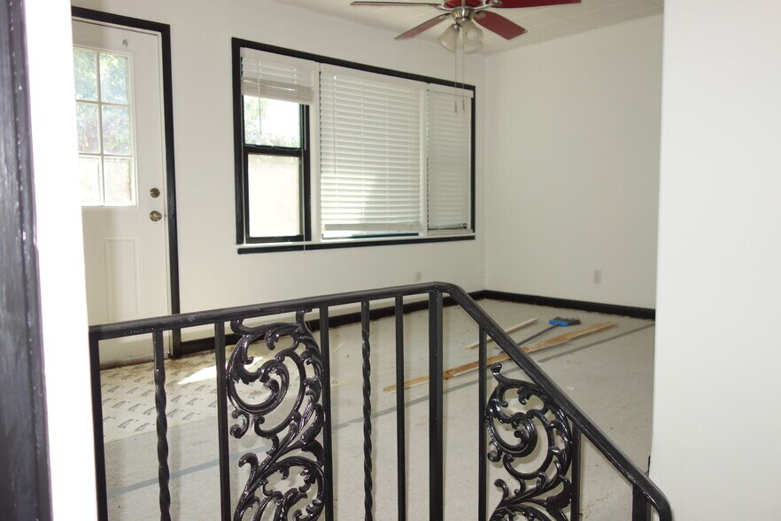 Secondary Bedroom View w/door to the backyard on the left. - 1745 S Birmingham Ave