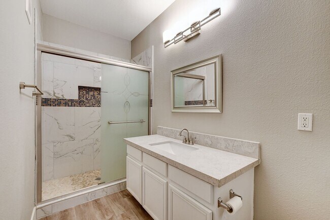 Building Photo - Upgrated upstairs 2 Bedrm 2 bath Gated Com...