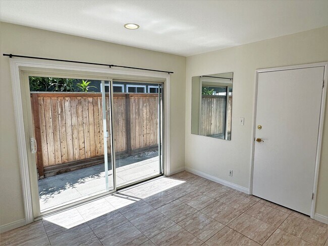Building Photo - Charming 2+1 PDR hills home w/ large lot. Jacuzzi, decks, fireplace, view, walk to the beach!
