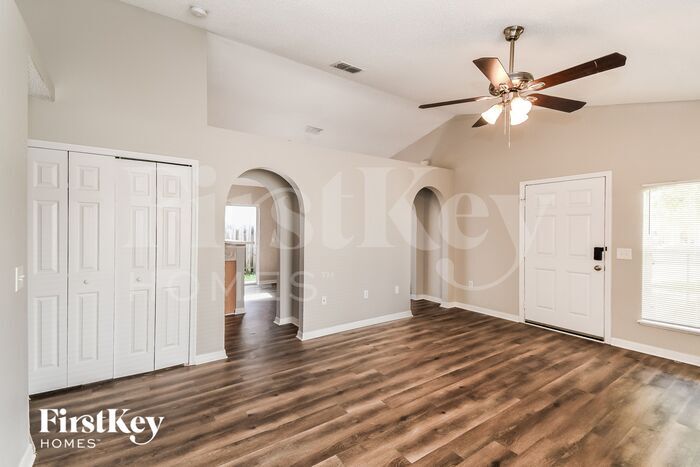 Building Photo - 6565 Gentle Oaks Dr