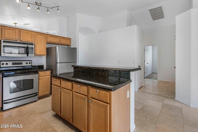 Building Photo - 10307 E Caribbean Ln