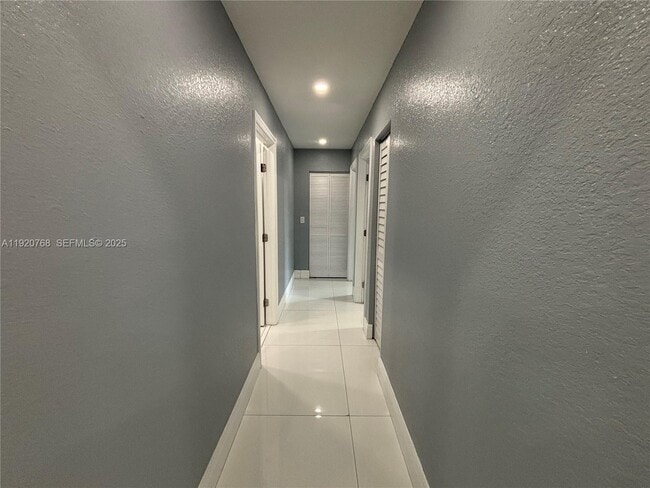 Building Photo - 7099 NW 48th Ct