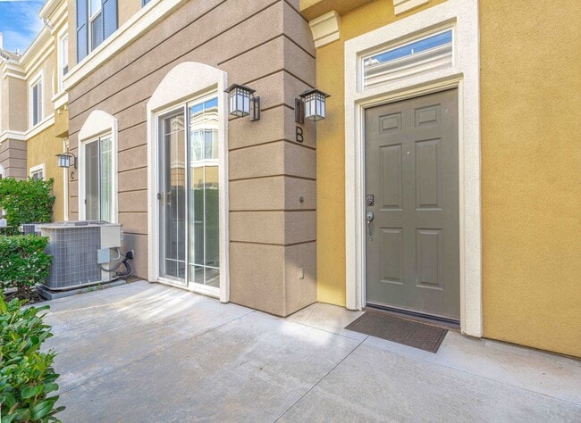 Building Photo - Stunning Upgraded Tri-Level Condo in South Coast Metro’s Exclusive Vantage Community