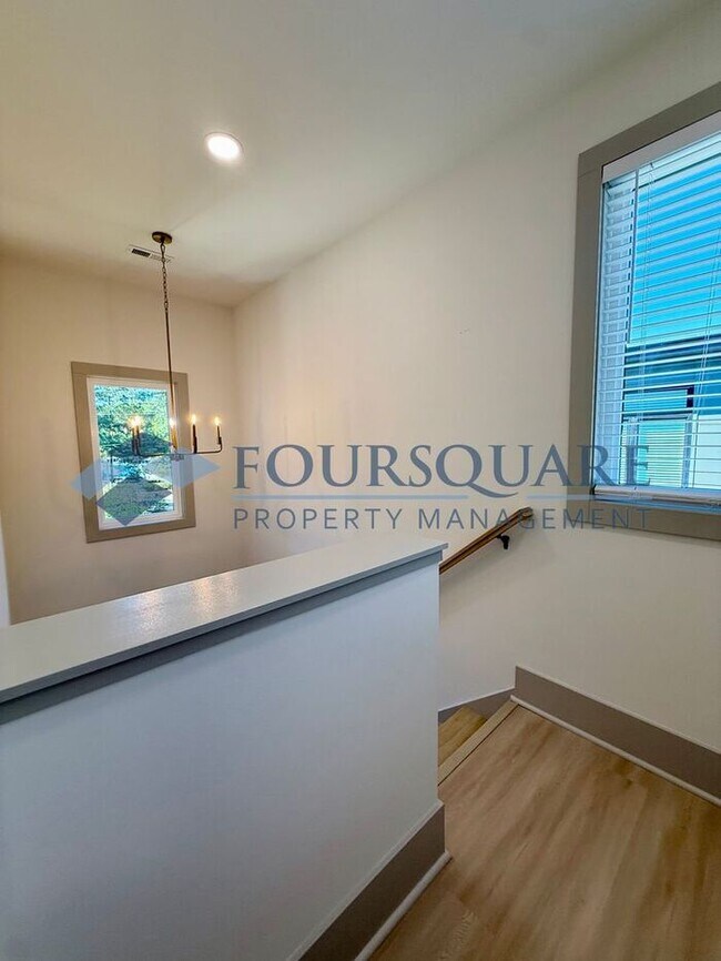 Building Photo - Modern 4-Bed Townhome with Designer Finishes, Dual Balconies & EV-Ready Garage – Inside the Beltl...