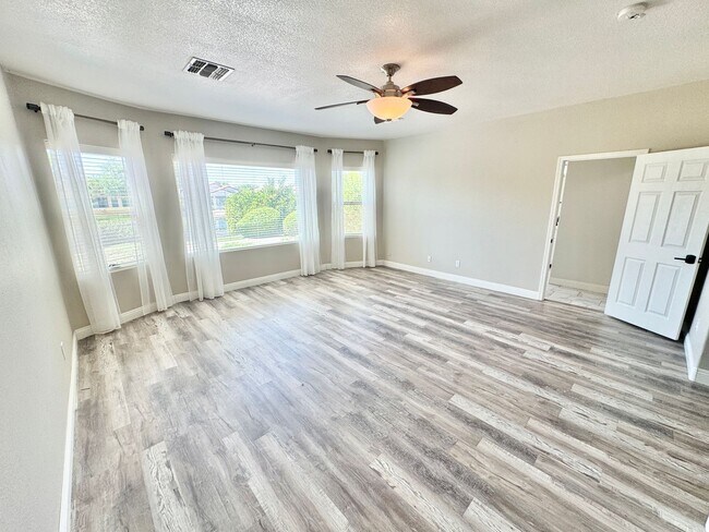 Building Photo - Pristine Single Level 3 Bedroom Home In The Sought After Gated Lagos Vistoso Community in Chandler!