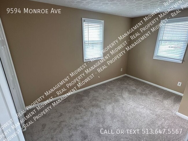 Building Photo - 9594 Monroe Ave