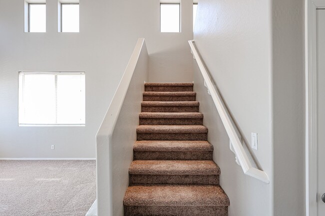 Building Photo - Welcome to this spacious 4 bedroom, 2.5 ba...