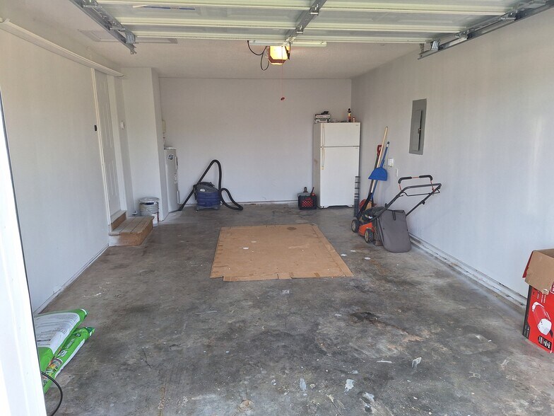 Garage to keep your vehicle out of the elements and extra storage! - 695 Artic Ave
