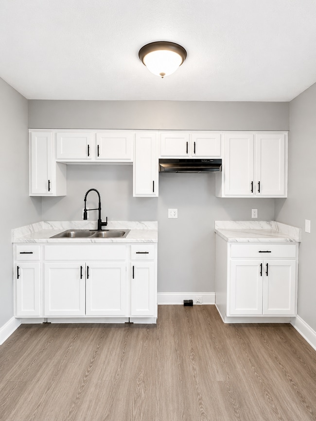 Building Photo - Stylishly Renovated 3-Bedroom Home with Finished Basement & Spacious Fenced Yard