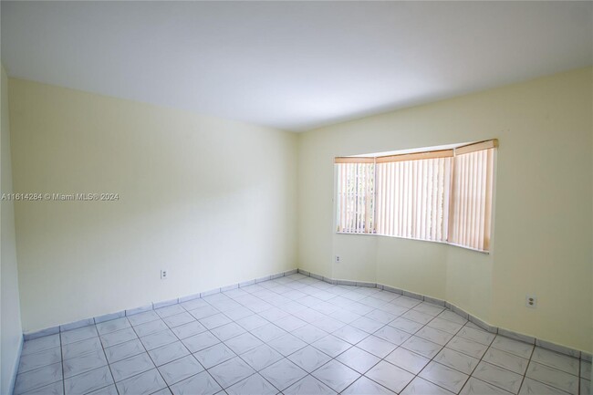 Building Photo - 6400 SW 138th Ct