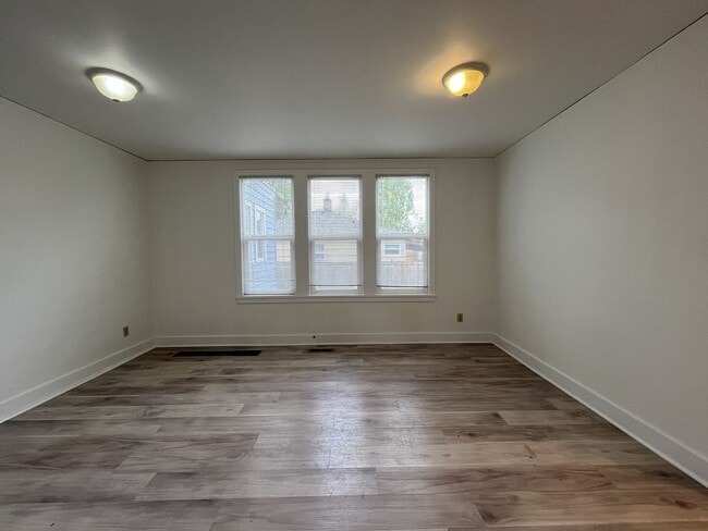 Building Photo - Expansive 4BR 2,900+ Sq Ft Home with Theater-Style Living Room & Bonus Hobby Workshop