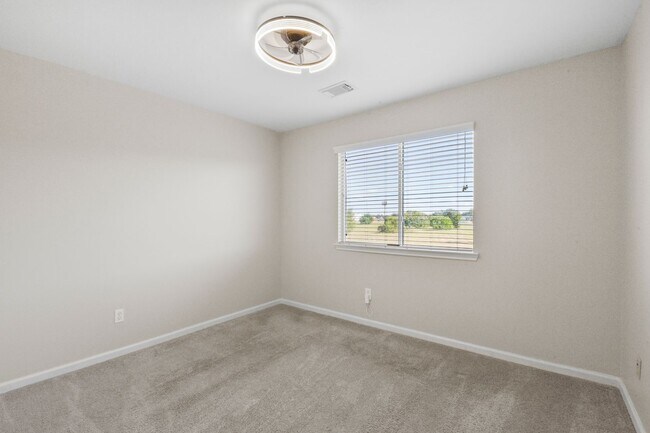 Building Photo - Stunning Corner Unit Townhome - Move-in special: Receive $100 off both your first and second mont...