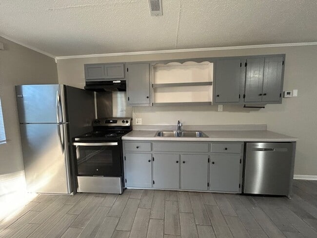 Building Photo - Call Property Manager Tonia Rollins at (50...