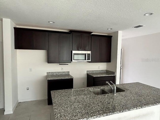 Building Photo - 4907 Conifer Cone Dr