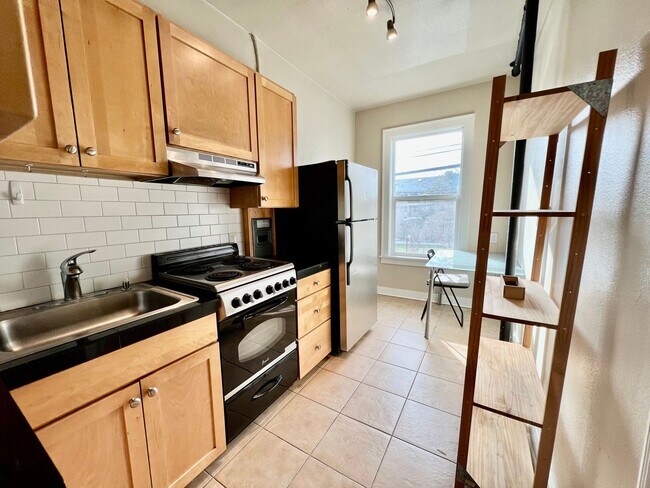 Building Photo - Classic Living at the Novell! Close to UW ...