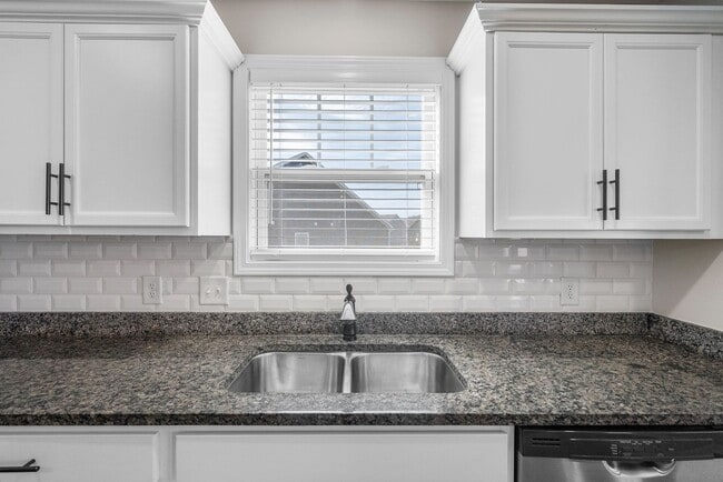 Building Photo - Pet Friendly Three Bedroom with Bonus!