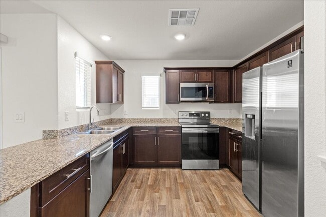 Building Photo - Resort-Style Living at Watercolors – Modern 3bd Townhome with Garage, Balcony & Included Internet