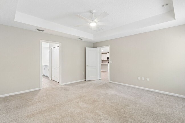 Building Photo - Modern 4BR Home with 3 Full Baths in River Glen | Screened Porch & Resort-Style Amenities