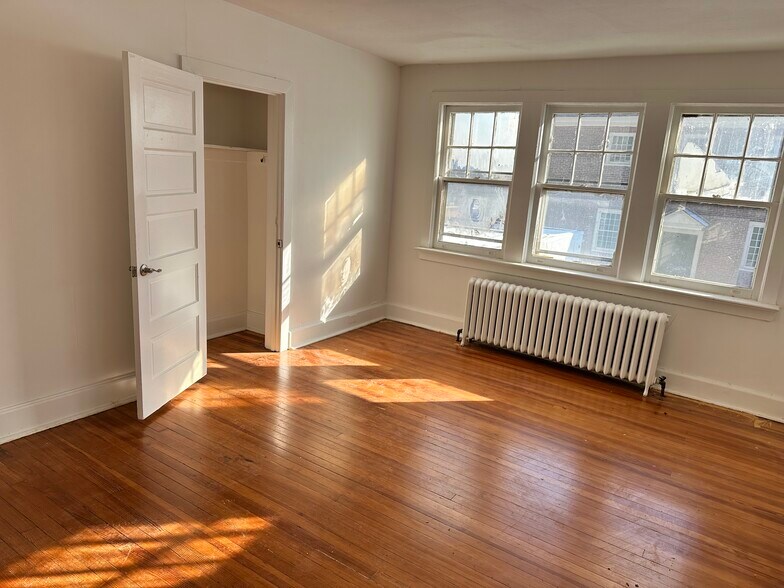 Bedrooms with original wood floors, LARGE walk in closets. - 328 High St