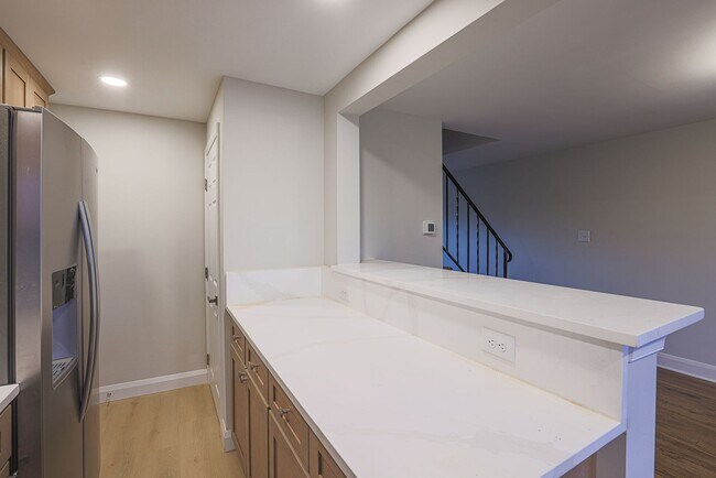 Building Photo - RENOVATED PARKVILLE TOWNHOME 3BR 1.5BA
