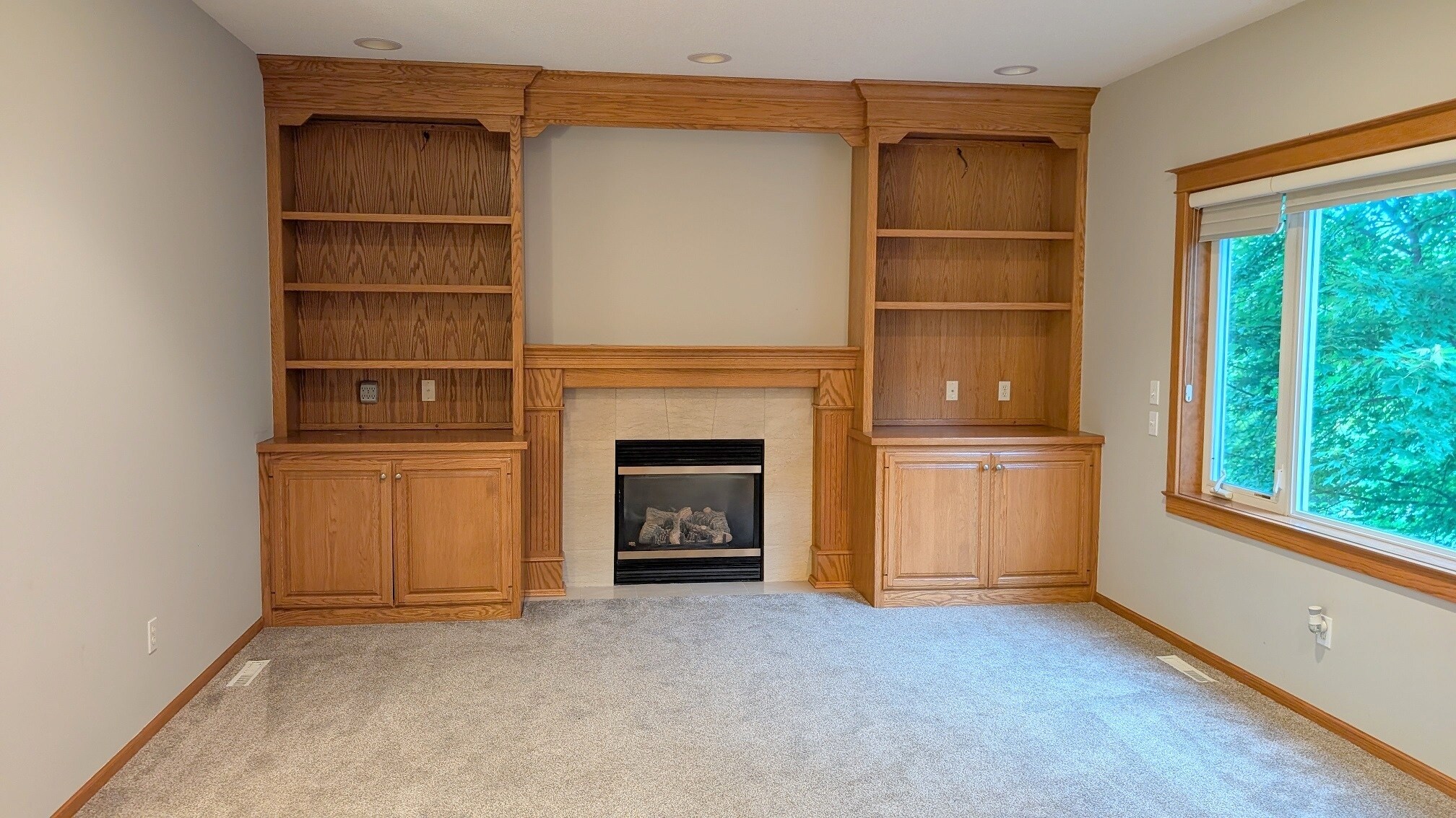 Living room with gas fireplace - 2669 Kathleen Ln NE