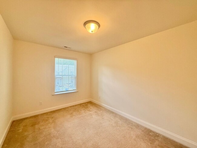Building Photo - Spacious 3BD, 2.5BA End Unit Raleigh Townhome Near White Oak Shopping Center, I-40, and Downtown ...