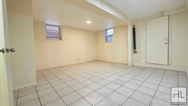Building Photo - 37-12-37-61 61st St