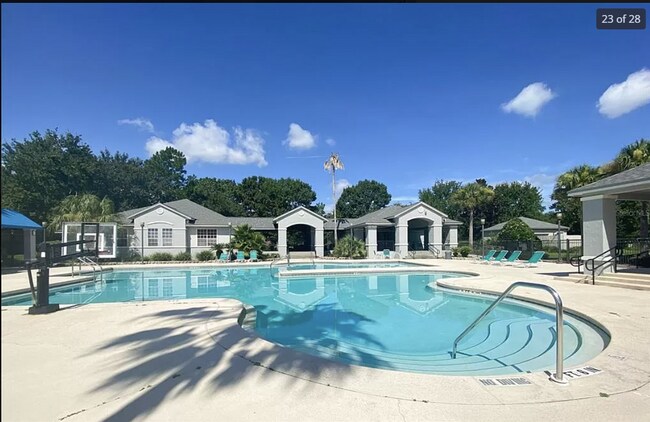 Building Photo - Modern 2-Bed/2-Bath Condo in Gated Communi...